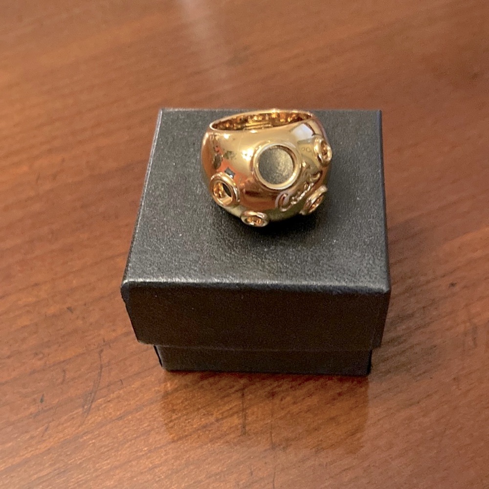 COACH GOLD TONE BRIDGET RING. SIZE 7. LIKE NEW. FIRM PRICE. REDUCED SHIPPING.